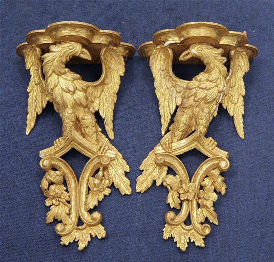 A pair of 19th century carved giltwood wall brackets, 17in.